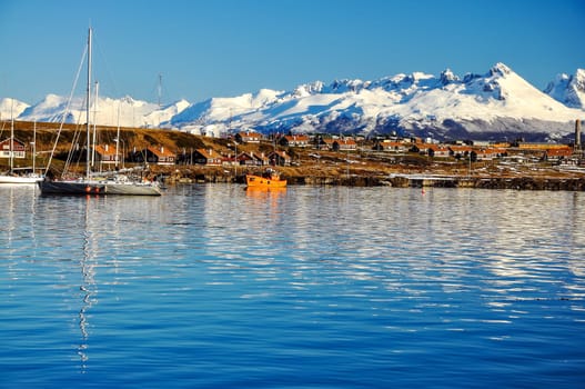 A view of Ushuaia and mountains seen from the Beagle Channel