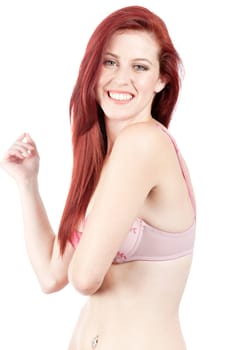 Attractive young woman in her underwear posing and having fun