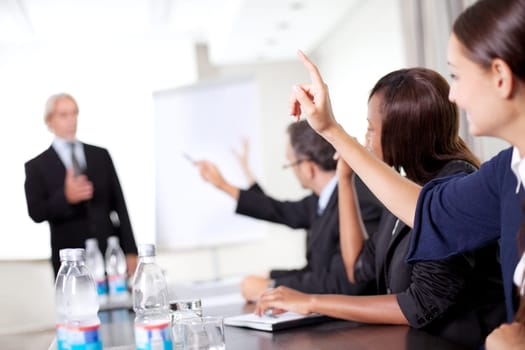 Business man explaining to his sales team