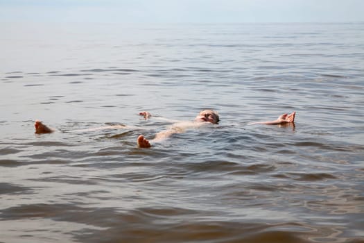 Boy bathing in the sea