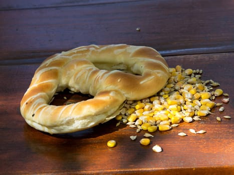 pretzel and seeds on the wooden table