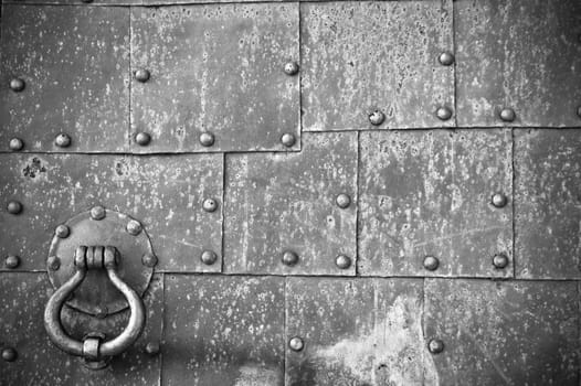 old pattern gate with a knocker
