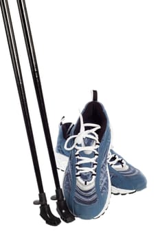 sticks for Nordic walking and  sports shoes  isolated on white