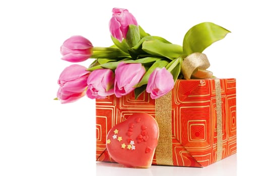 Pink tulips and gift box, it is isolated on white
