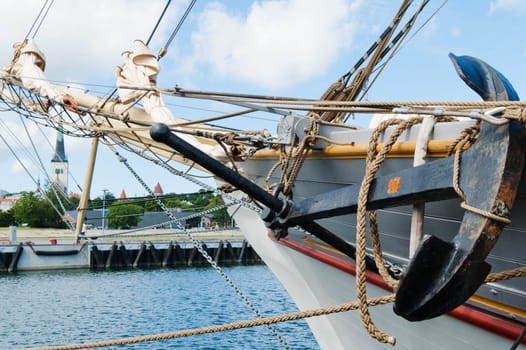 Old sailing ship masts and sails and rigging