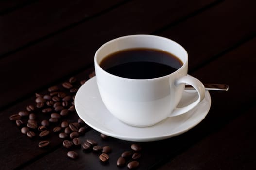 Black coffee on a wooden table