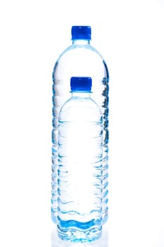 Large and small water bottle over white background