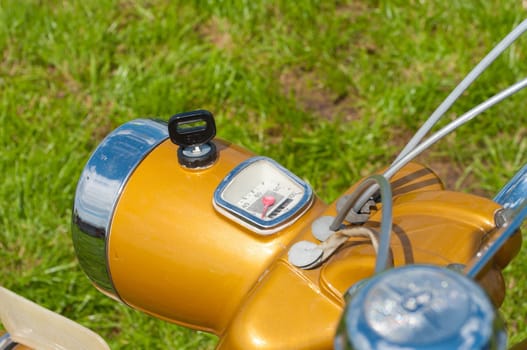 headlight of a zundapp oldtimer moped during a meeting in Twenterand, Netherlands on June 30, 2012