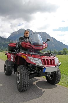 With the quad bike in front of Neuschwanstein Castle