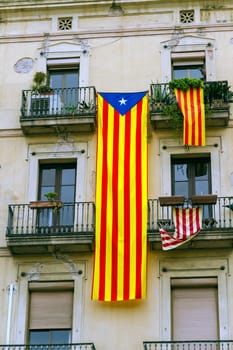 Catalan flags placed on balconies, Something done the day of National Day of Catalonia