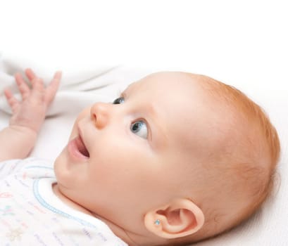 Closeup of Happy Smiling Newborn Baby on White Background