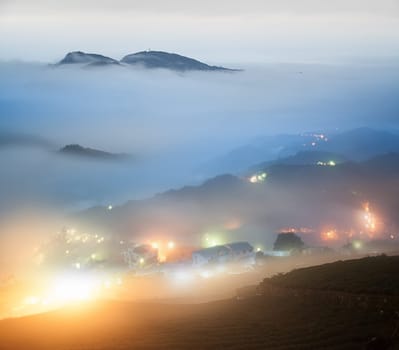 mountain valley with beautiful cloud in the sky at dawn