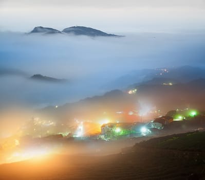 mountain valley with beautiful cloud in the sky at dawn
