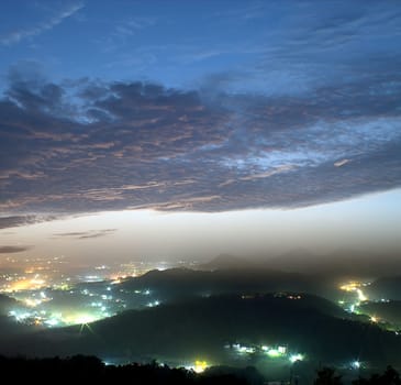 mountain valley with beautiful cloud in the sky at dawn