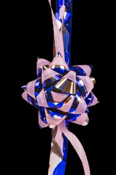 Macro flower ornament, pink and blue, isolated on black background