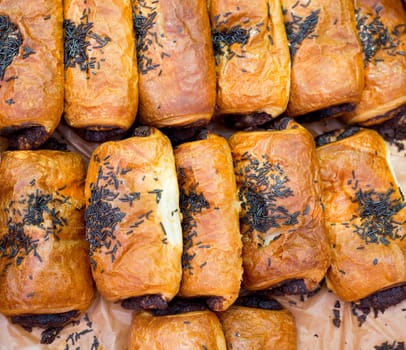 Bakery Croissant Neapolitan chocolate cakes in a row