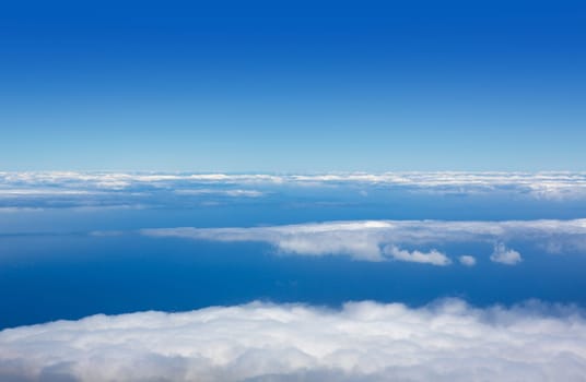 Blue perfect sky sea of clouds from high altitude in canary Islands