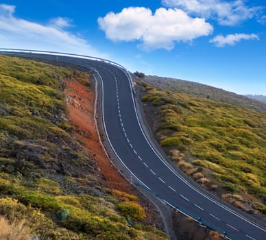 green mountain winding road curves dangerous for drivers