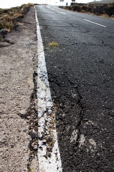 Damaged road grunge paint weathered in Canary Islands