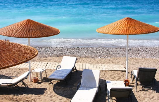 Beach chairs and umbrellas on a beach