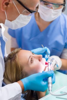 Scared patient at dentist office have teeth checkup stomatology