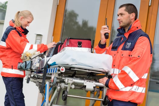 Emergency paramedics radio call ambulance house door visit doctor
