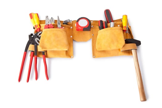 Toolbelt with various tools lying on the bench
