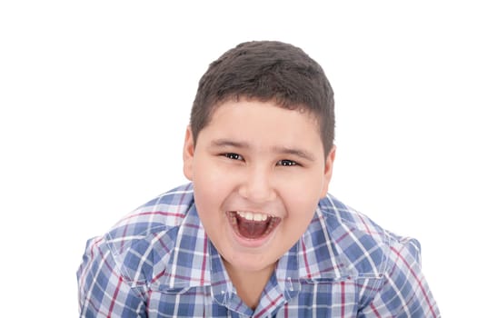 A boy screaming loud with mouth wide open