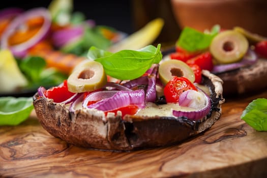 Giant Portobello mushrooms stuffed with mozzarella and tomatoes