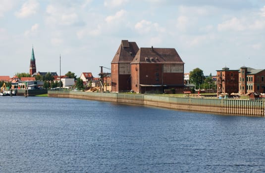 The photograph of an old industrial site on the river Elbe in Wittenberge.