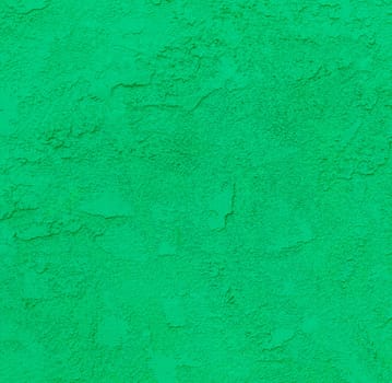 green concrete wall with rough pattern