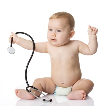 Sweet baby with stethoscope on a white background. Adorable baby boy on white