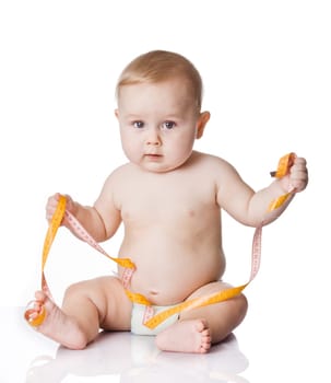Adorable Baby Boy with a measuring tape.