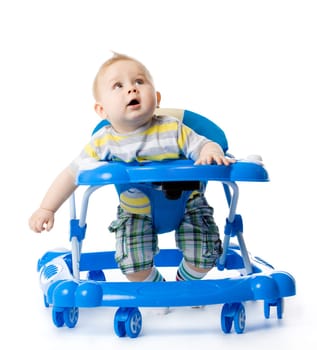 little  baby in the baby walker.