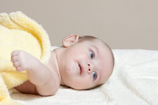 Newborn - close-up focus baby boy with yelow blanket