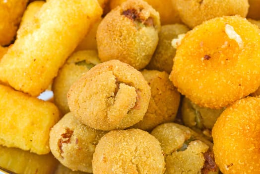 supplì, rice balls, potato croquettes, stuffed olives and fried mozzarella