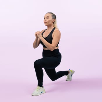 Active and fit physique senior woman warming up before exercise on isolated background. Healthy lifelong senior people with fitness healthy and sporty body care lifestyle concept. Clout