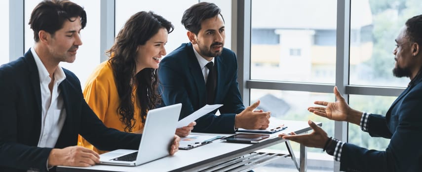 Diversity recruiters interview candidate at the bright office. A group of human resources professionals explaining an applicant for a new position. asking interviewee a question. Intellectual.