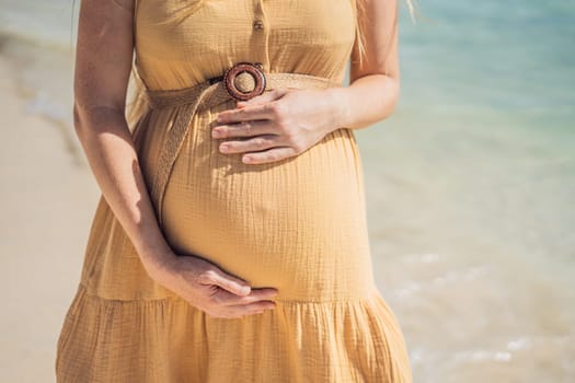 Radiant and expecting, a pregnant woman stands on a pristine snow-white tropical beach, celebrating the miracle of life against a backdrop of natural beauty.