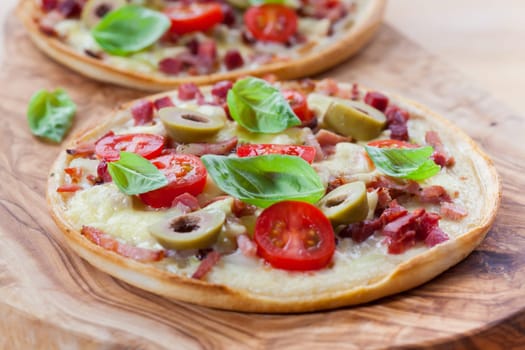 Tradition French tarte flambee with olive and basil