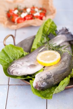 Prepare fresh fish in the kitchen