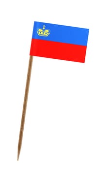 Tooth pick wit a small paper flag of Liechtenstein