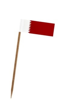 Tooth pick wit a small paper flag of Quatar