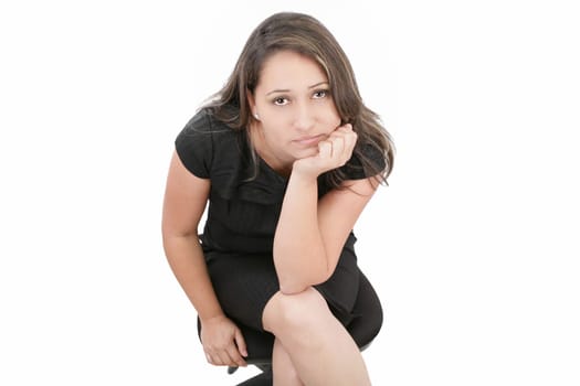 young caucasian woman looking straight at the camera with a very neutral look