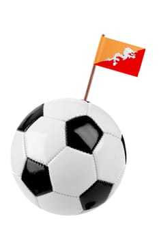 Soccer ball or football decorated with a small national flag of Bhutan on a tooth stick
