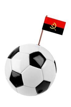 Soccer ball or football decorated with a small Angola flag on a tooth stick