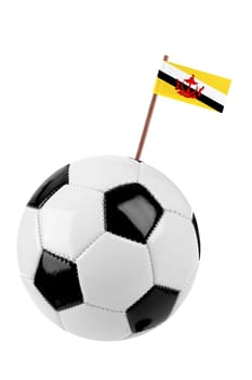 Soccer ball or football decorated with a small national flag of Brunei on a tooth stick