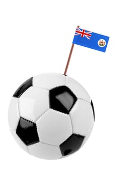 Soccer ball or football decorated with a small national flag of Hongkong on a tooth stick