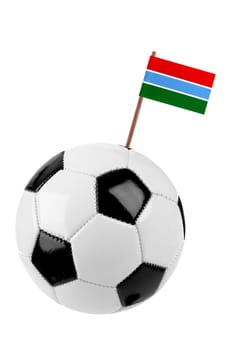 Soccer ball or football decorated with a small national flag of Gambia on a tooth stick