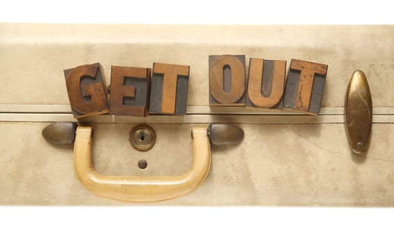 vintage suitcase with words 'get out'